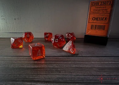 23073 - Translucent Polyhedral Orange/white 7-Die Set