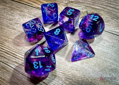 27557 - Nebula® Polyhedral Nocturnal™/blue Luminary™ 7-Die Set