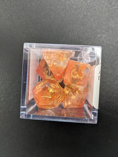 Critical Hit Collectibles Snowflake Orange Set of 7 Filled Polyhedral Dice w/ Orange Numbers for D20 Based RPG's - Critical Hits
