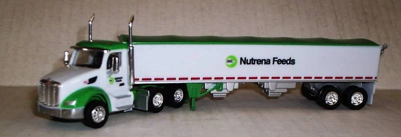 Peterbilt 579 Day Cab (White, Green Trim) W/ Nutrena (Old Logo) Grain Trailer (White, Green Trim) Scale 1:87 (HO Scale) Model By Trucks N Stuff