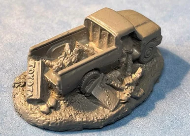 PIG170205 - TOYOTA PICK'EM UP TRUCK DESTROYED W/CASUALTIES (RESIN)